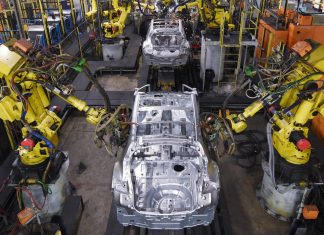Manufacturing slump puts UK economy into reverse as Brexit looms